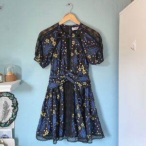 self portrait wildflower mini dress. floral pattern with cutouts chest ruffles